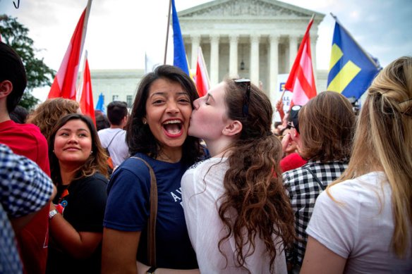 This NY Times.com photo's caption reads, "Pooja Mandagere and Natalie Thompson celebrate the Supreme Court's decision" (NYTimes.com)